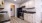 a kitchen with wooden cabinets