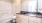 a bathroom with a dark countertop