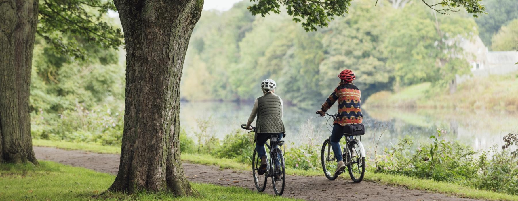 two people riding bikes
